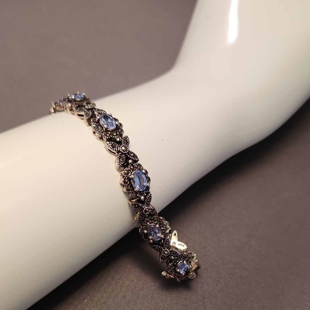 Intricate Silver And Blue Floral Bracelet
